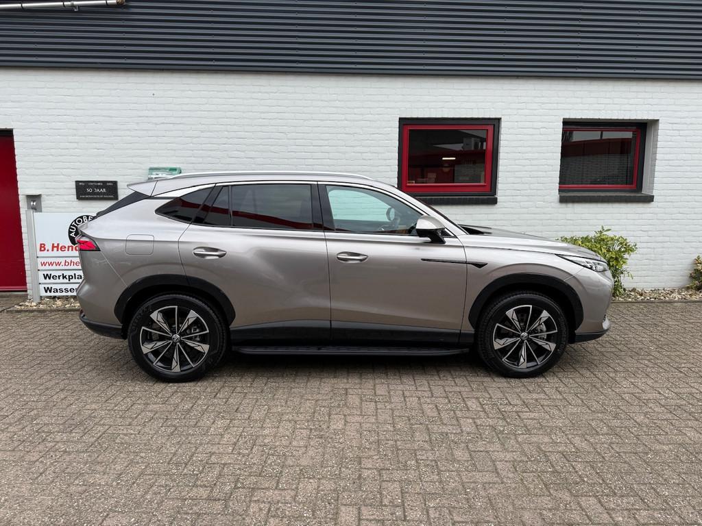 MG Hs 1.5T GDI PHEV Aut Comfort/ Nieuwe voorraad auto/ Beige, Auto's, MG, Automaat, Stof, Gebruikt, 4 cilinders
