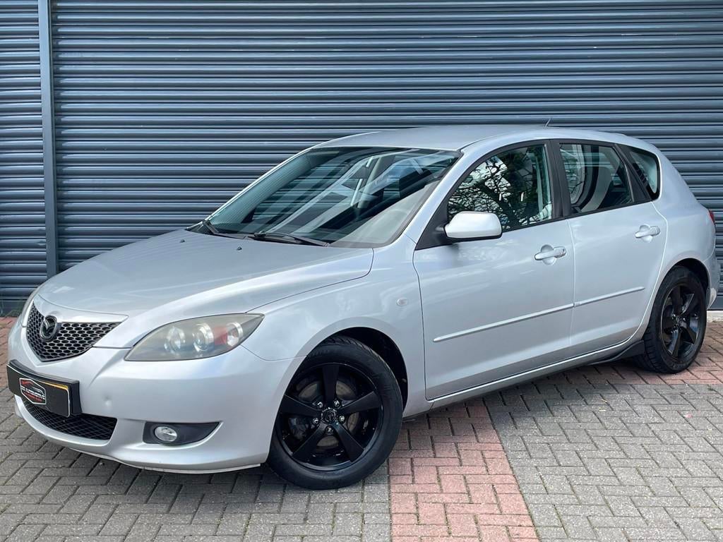 Mazda 3 Sport 1.6 Touring Airco | Trekhaak | Elektr Pakket, Auto's, Mazda, Voorwielaandrijving, Stof, Gebruikt, Zwart