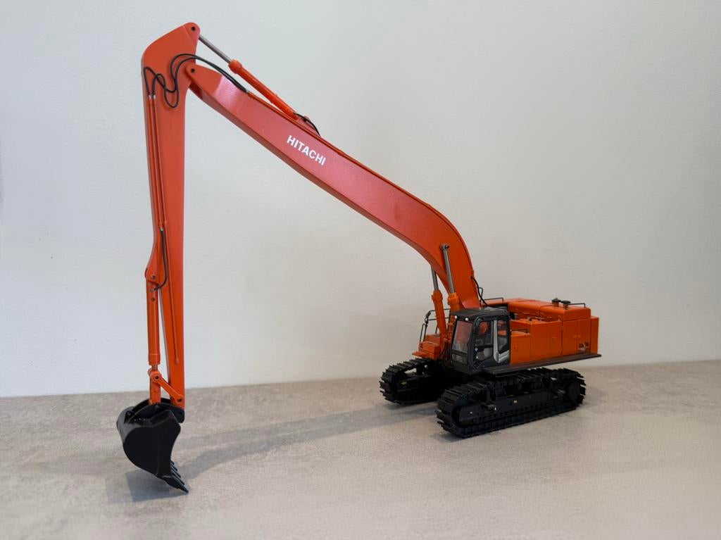 Hitachi 870 long reach wsi, Hobby en Vrije tijd, Modelauto's | 1:50, Zo goed als nieuw, Bus of Vrachtwagen, Wsi, Ophalen of Verzenden