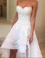 Fraaie nieuwe kort lang trouwjurk €749 34 36 38 40 42 44, Ophalen, Nieuw, Wit, Trouwjurk