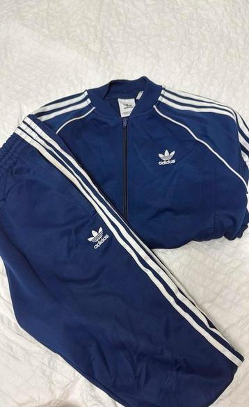 Trainingspak heren adidas beschikbaar voor biedingen