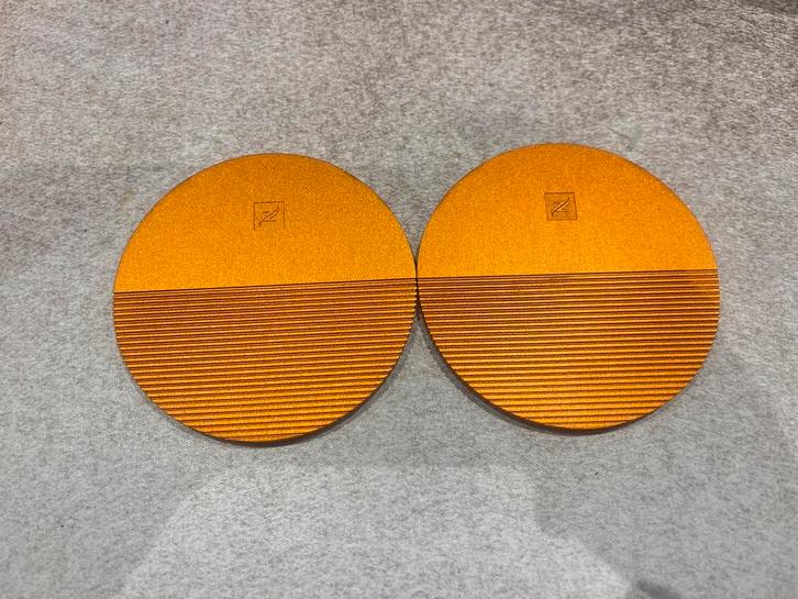 2x Nespresso desgn orange onderzetters aluminium, Huis en Inrichting, Woonaccessoires | Onderzetters, Glas of Kopje, Ophalen