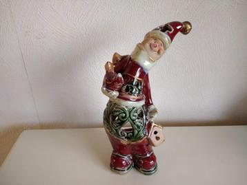Grote waxinelichthouder kerstman met vogel 25 cm hoog beschikbaar voor biedingen