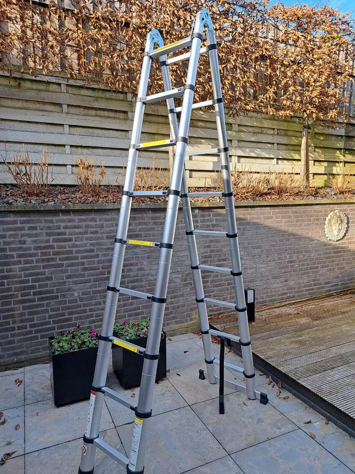 Herzberg Telescopische Ladder 2.80m - 5.60m - Opvouwbaar, Doe-het-zelf en Verbouw, Ladders en Trappen, 2 tot 4 meter, Ophalen