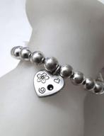 Mooie zilverkleurige armband met daaraan een hartje, Ophalen, Nieuw, Zilver, Overige materialen