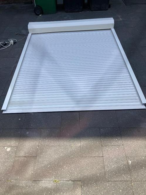 nieuw wit electrisch rolluik breed 1.69 mtr  x 2.15,5 hoog, Doe-het-zelf en Verbouw, Rolluiken, Nieuw, 200 cm of meer, 150 tot 200 cm
