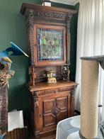 Smalle hoge kast, Ophalen