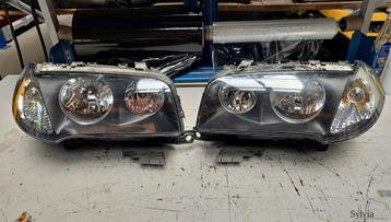 Koplamp set links en rechts BMW X3 serie E83  beschikbaar voor biedingen