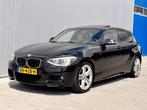 BMW 1-serie 116i - M pakket - Xenon - Dakje - Automaat -Navi, Gebruikt, 4 cilinders, Zwart, 650 kg