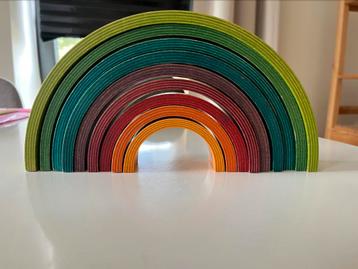 Naef swiss houten regenboog beschikbaar voor biedingen