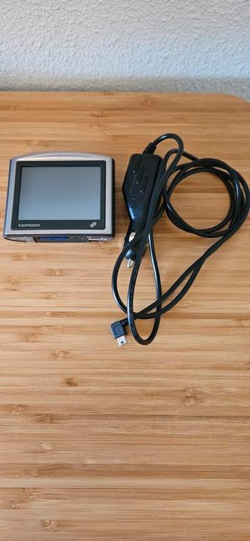 TomTom One autonavigatie, oplader+sdkaart N14644, als NIEUW! beschikbaar voor biedingen