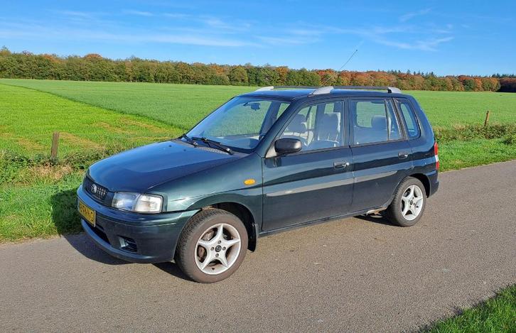 Mazda Demio 1.3 Comfort 2000 Groen, Auto's, Mazda, Particulier, Demio, Airbags, Dakrails, Lichtmetalen velgen, Metallic lak, Startonderbreker