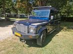 Land Rover Defender 110 TD5 2003, Auto's, 2500 cc, Zwart, Blauw, Leder en Stof