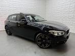BMW 1-serie 118i Centennial High Executive AUTOMAAT DAK, Auto's, BMW, 65 €/maand, Gebruikt, Zwart, Bedrijf
