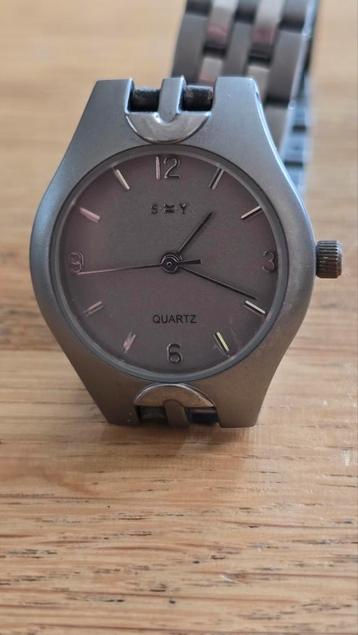 SkY volledig titanium dames horloge met nieuwe batterij beschikbaar voor biedingen
