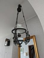 hangende olielamp, Ophalen