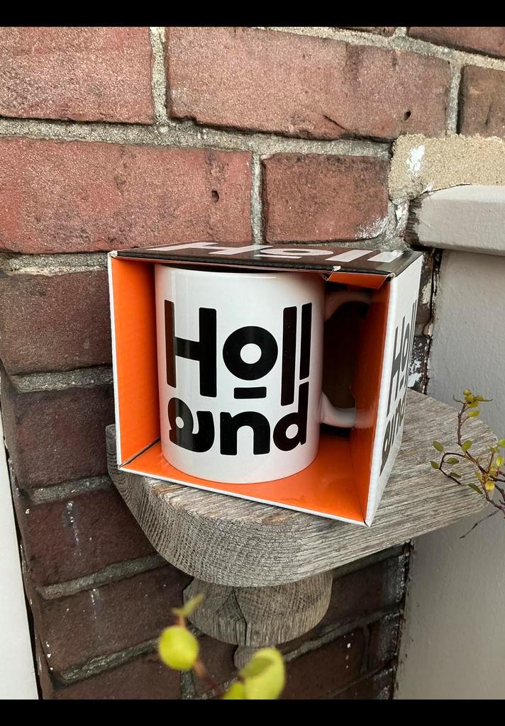 Nieuwe, ongebruikte mok in originele doos met tekst: Holland, Antiek en Kunst, Kunst | Designobjecten, Ophalen of Verzenden