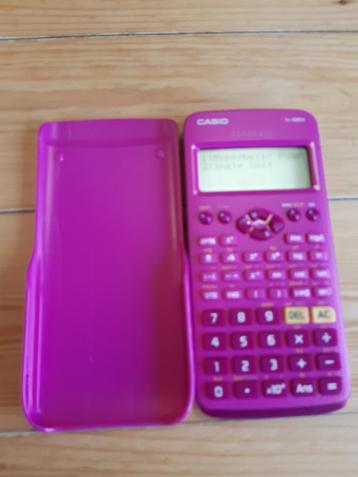 Leuke paarse en roze rekenmachine  beschikbaar voor biedingen