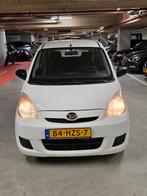 Daihatsu Cuore 1.0 5D 2009 Wit, Auto's, Daihatsu, Voorwielaandrijving, Stof, 600 kg, Zwart