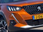Peugeot 2008 1.2 PureTech GT-Line 130pk Automaat - Orange Fu, Auto's, Gebruikt, Leder en Stof, 1180 kg, 3 cilinders