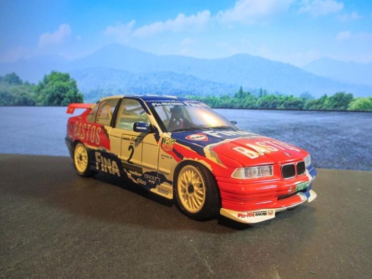 BMW E36 318is - UT-Models Bastos Tassin/Mueller/Burgstaller, Hobby en Vrije tijd, Modelauto's | 1:18, Zo goed als nieuw, UT Models