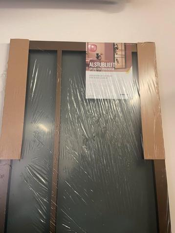 Nieuwe stompe binnendeur in bronzen kleur. beschikbaar voor biedingen