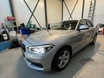 BMW 1-Serie 118i Urban 136pk EDE Aut 2015 Grijs, 65 €/maand, USB, Leder en Stof, Bedrijf