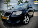 Volkswagen Touran 1.4 TSI Comfortline, climatronic, xenon de, Voorwielaandrijving, Stof, Gebruikt, Zwart