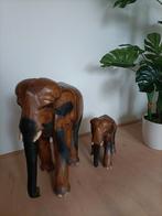 Moeder en jong houten olifanten houtsoort teak?, Ophalen