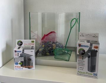 Aquarium met aqua-flow, extra filters en visnetje beschikbaar voor biedingen