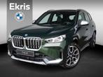 BMW iX1 IX1 xDrive30 X-Line | Stoelverwarming | 19 inch | St, Auto's, BMW, Stof, Gebruikt, Zwart, Lichtsensor