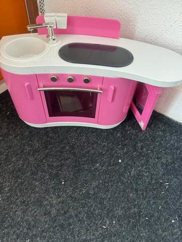 Leuke roze speelkeuken beschikbaar voor biedingen