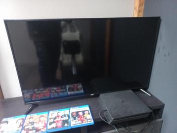 TV met Play Station 4 en racestoel beschikbaar voor biedingen