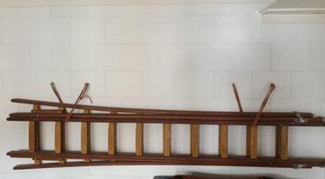Schildersladder uitschuifladder houten ladder beschikbaar voor biedingen