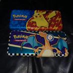 Pokémon Mystery Tins - Pikachu/Charizard, Hobby en Vrije tijd, Verzamelkaartspellen | Pokémon, Ophalen of Verzenden, Zo goed als nieuw