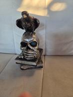 Doodshoofd voor waxinelampje, Ophalen