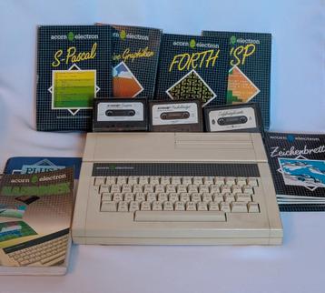 Acorn Electron met Plus 1 uitbreiding + software & games beschikbaar voor biedingen