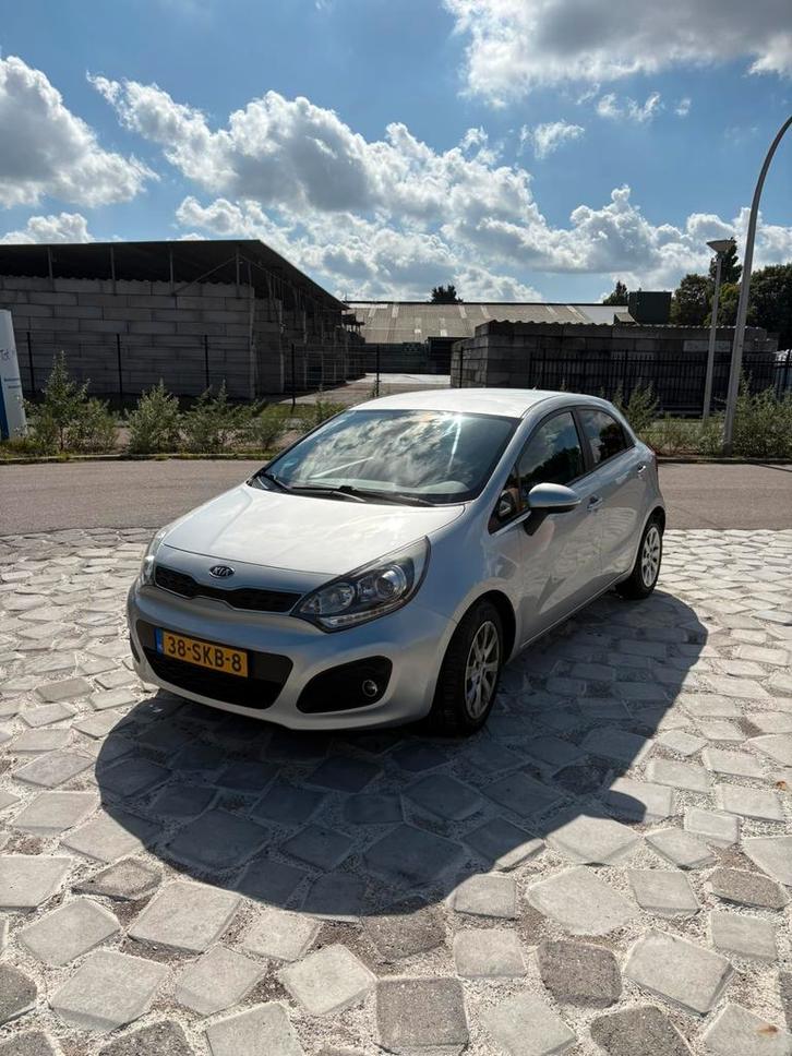 Kia Rio 1.2 I 5DRS 2011 Grijs, Auto's, Kia, Particulier, Rio, ABS, Airbags, Airconditioning, Bochtverlichting, Centrale vergrendeling