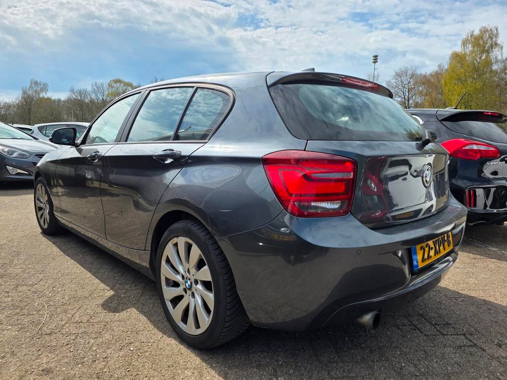 BMW 1-serie 118i Business+ AUTOMAAT/navi/CRUISE, Auto's, BMW, Euro 5, Achterwielaandrijving, Gebruikt, 4 cilinders
