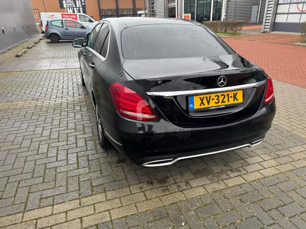 Mercedes-Benz C-Klasse C180 1.6 115KW Aut7 2014 Zwart, Auto's, Mercedes-Benz, Automaat, 1800 kg, Zwart, Zwart