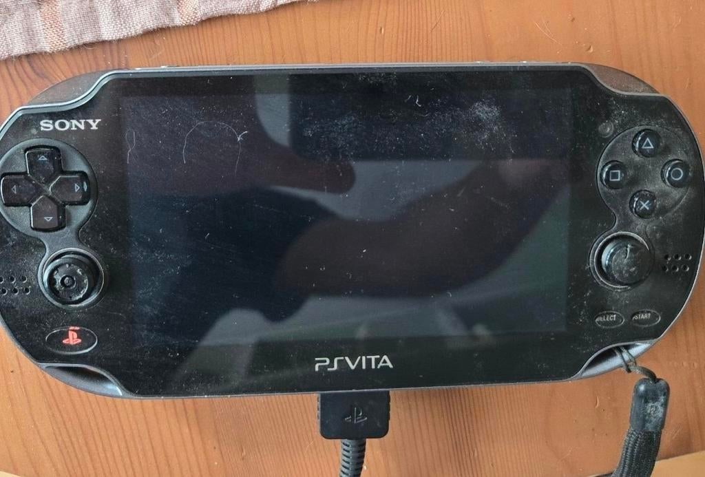 PS Vita met originele doos, 3 games (o.a. God of War), Ophalen of Verzenden, Gebruikt, Zwart, Met games