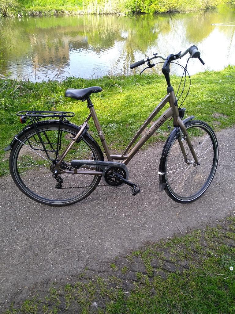 Gazelle Damesfiets in nieuwstaat €400,-, Fietsen en Brommers, Fietsen | Dames | Damesfietsen, Ophalen, Versnellingen, 56 cm of meer