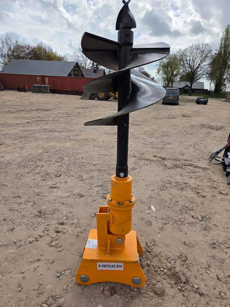 Grondboor met boor voor graafmachines, Ophalen