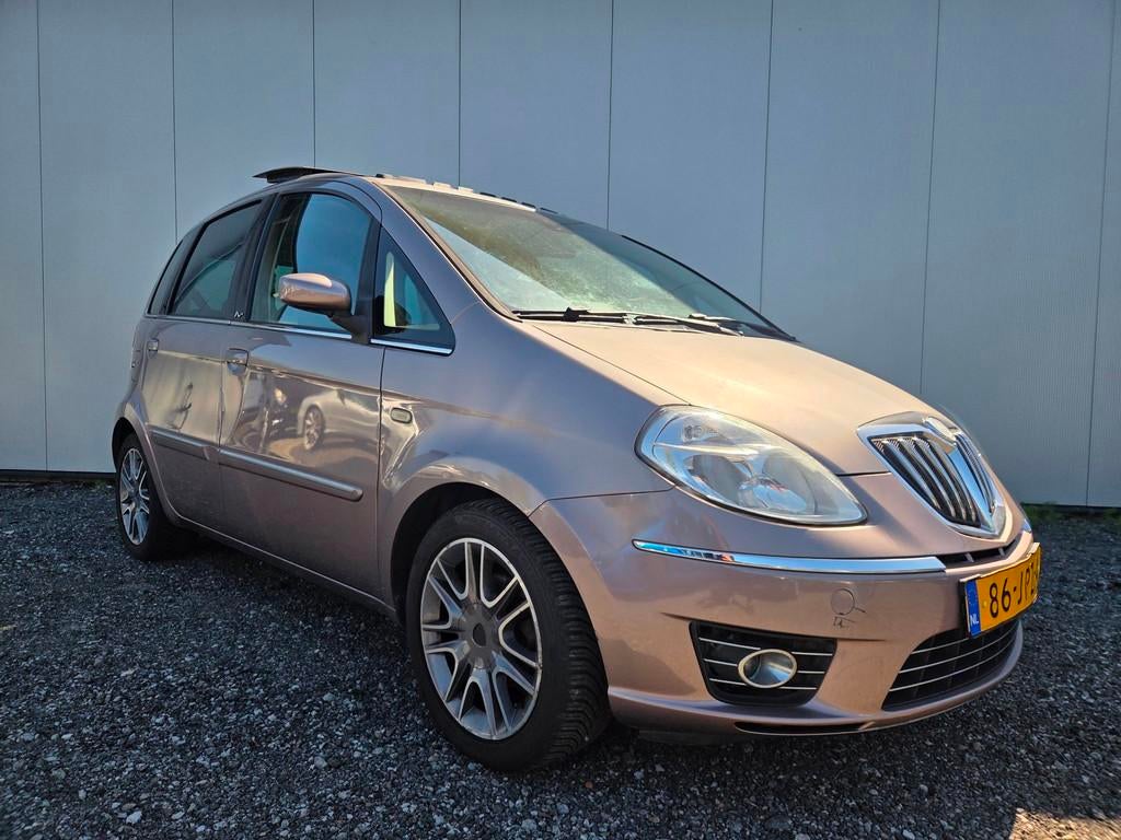 Lancia Musa 1.4-16V Platino | Leer | Dak | Airco | PDC | Cru, Auto's, Lancia, 15 km/l, Gebruikt, Bruin, 400 kg