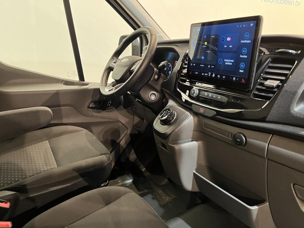 Ford E-Transit 390 (3500 kg) L2H2 Trend 68 kWh / 100% Elektr, Auto's, Bestelauto's, Automaat, Gebruikt, Zwart, Met garantie (alle)