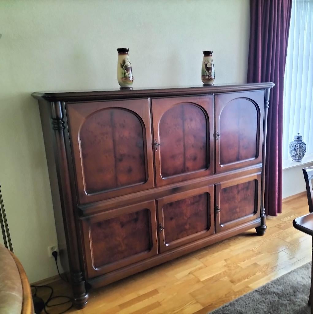 wortelnoten houten kast, Ophalen