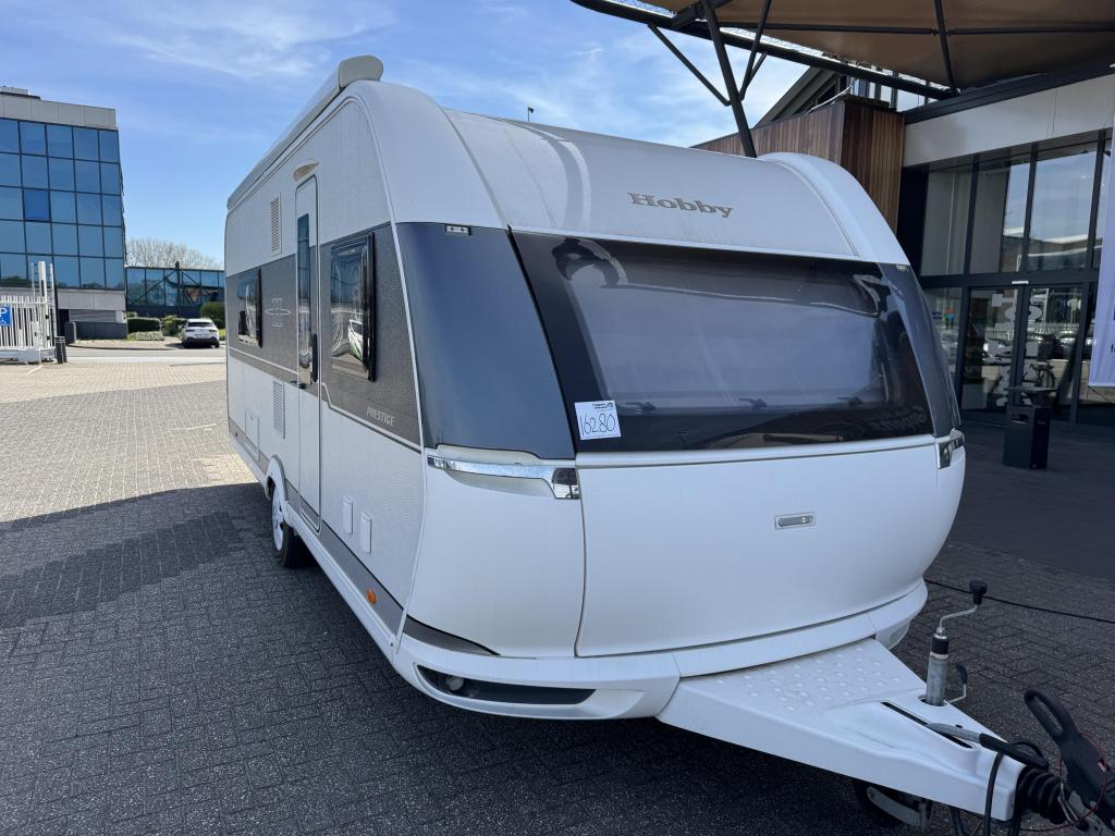 Hobby Prestige 560 WFU 2018 Mover,Airco,Luifel!!, Caravans en Kamperen, Standaardzit, Bedrijf, 5 tot 6 meter, Schokbreker