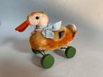 Antieke eend op wielen van Steiff met label, Ophalen of Verzenden