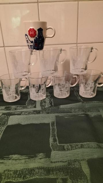 7 Glazen en1 stenen Senseo mokjes opdruk Amsterdamse huisjes beschikbaar voor biedingen