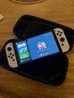 Nintendo Switch OLED, Spelcomputers en Games, Spelcomputers | Nintendo Switch, Ophalen of Verzenden, Zo goed als nieuw, Met 2 controllers